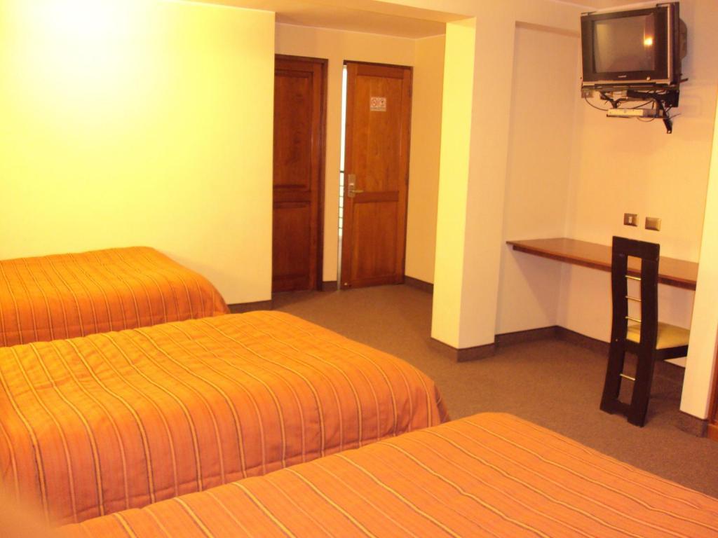 Mosoq Inn Puno Quarto foto